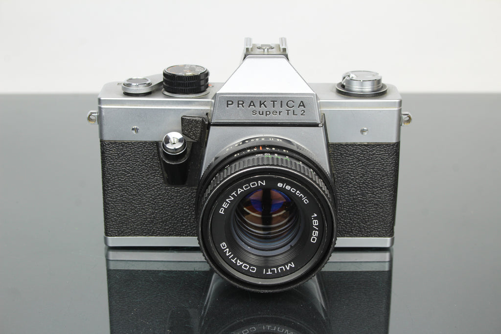 <tc>Praktica</tc> super TL2 + Pentacon elektrisches 50mm 1.8 M42 Objektiv