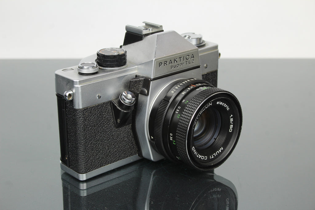 <tc>Praktica</tc> super TL2 + Pentacon elektrisches 50mm 1.8 M42 Objektiv