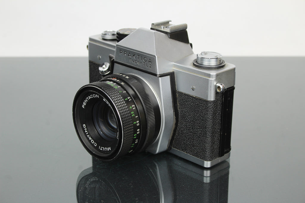 <tc>Praktica</tc> super TL2 + Pentacon elektrisches 50mm 1.8 M42 Objektiv
