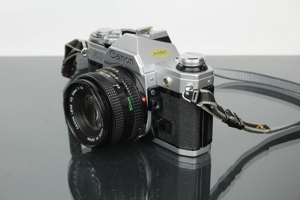 Canon AE - 1 + 50mm 1.8 FD lens - Dutch|Thrift