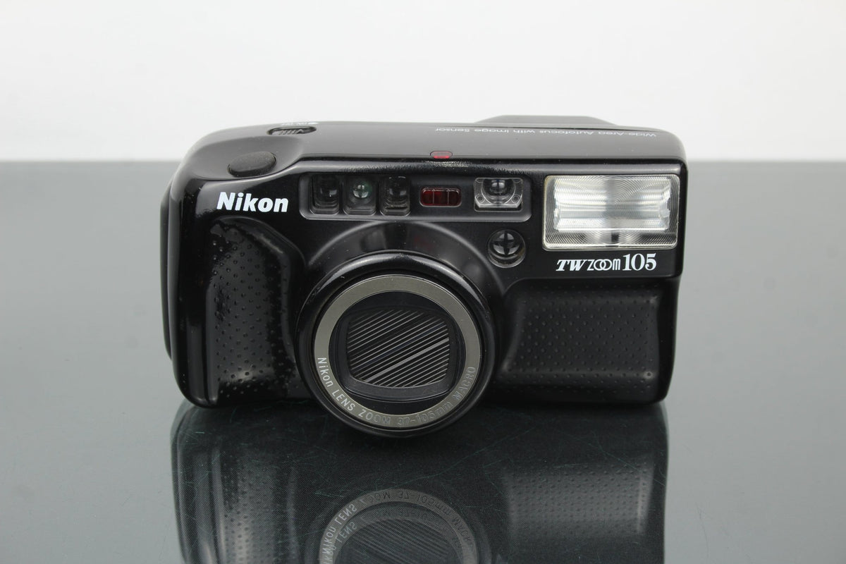 Nikon TW zoom 105 - Dutch|Thrift