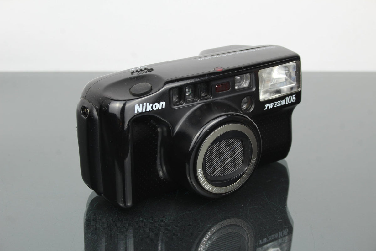 Nikon TW zoom 105 - Dutch|Thrift